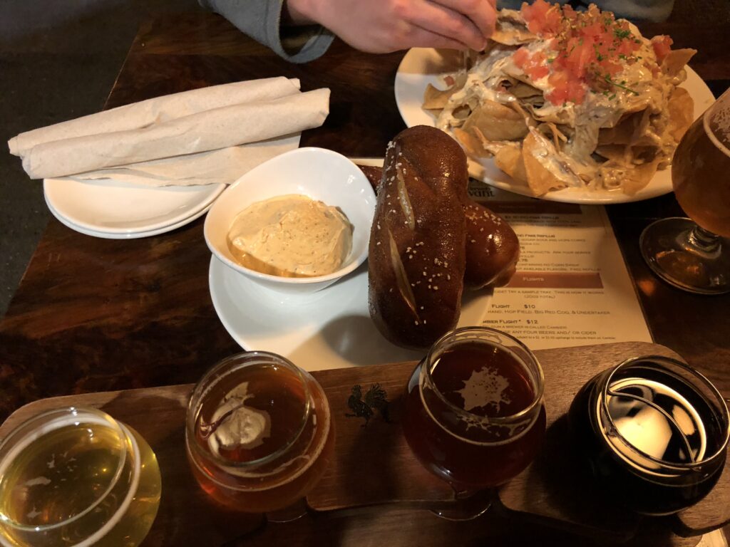 Duck Confit nachos, beer cheese and pretzel